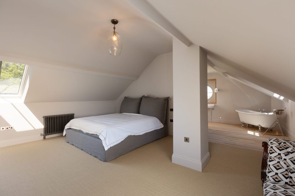 Bedroom with the bathroom beyond at The Old Rectory